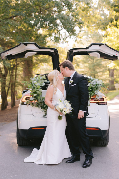 Tesla, just married, bride and groom, luxury wedding, wedding car, wedding exit, Greenbrier wedding