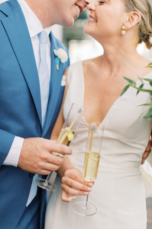 bride and groom, champagne, wedding day, just married, style me pretty, Pamela Barefoot Events, summer wedding, Florida wedding, blue wedding, cocktail stirrers