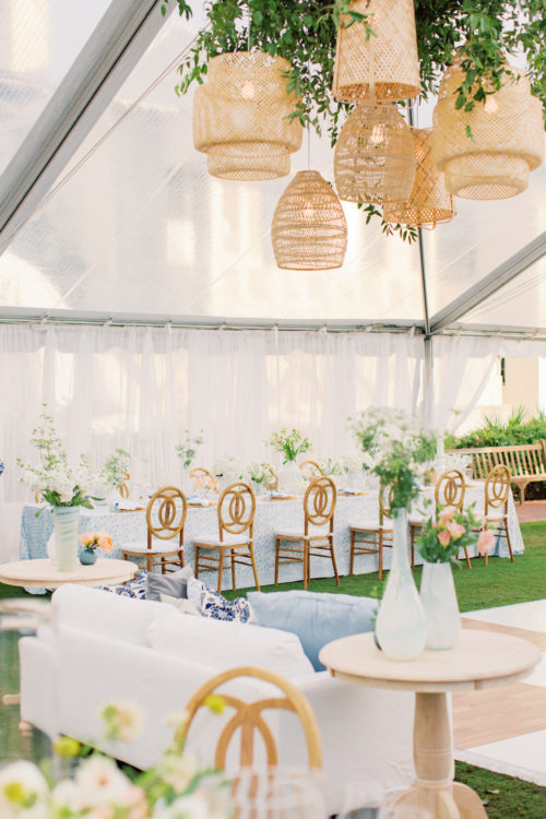 rattan chandelier, wedding designer, Florida wedding, blue and white wedding, Pamela Barefoot Events, tented wedding, wedding tent, place settings